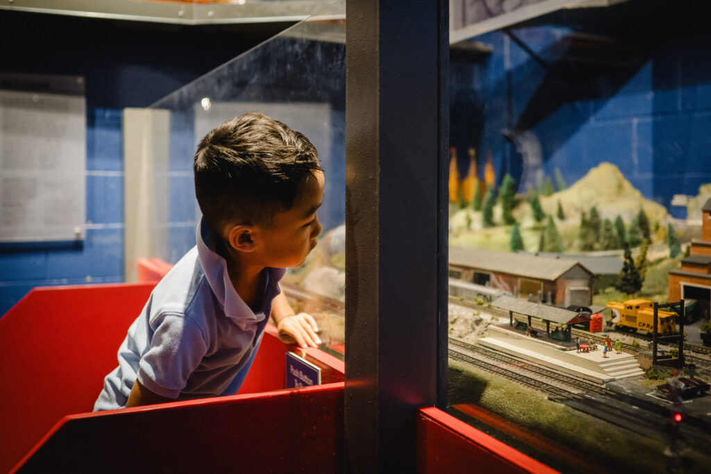 A kid exploring the PumpHouse