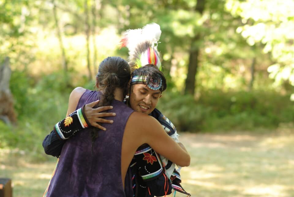 Two people hugging