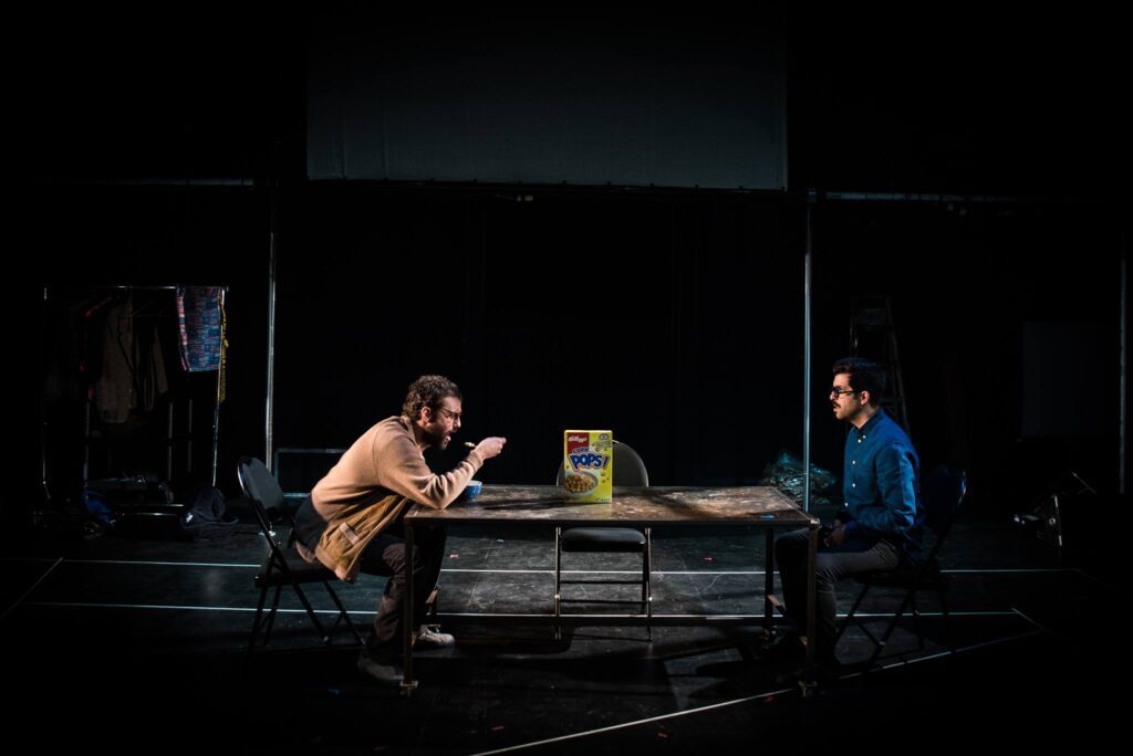 Two people sitting at a table