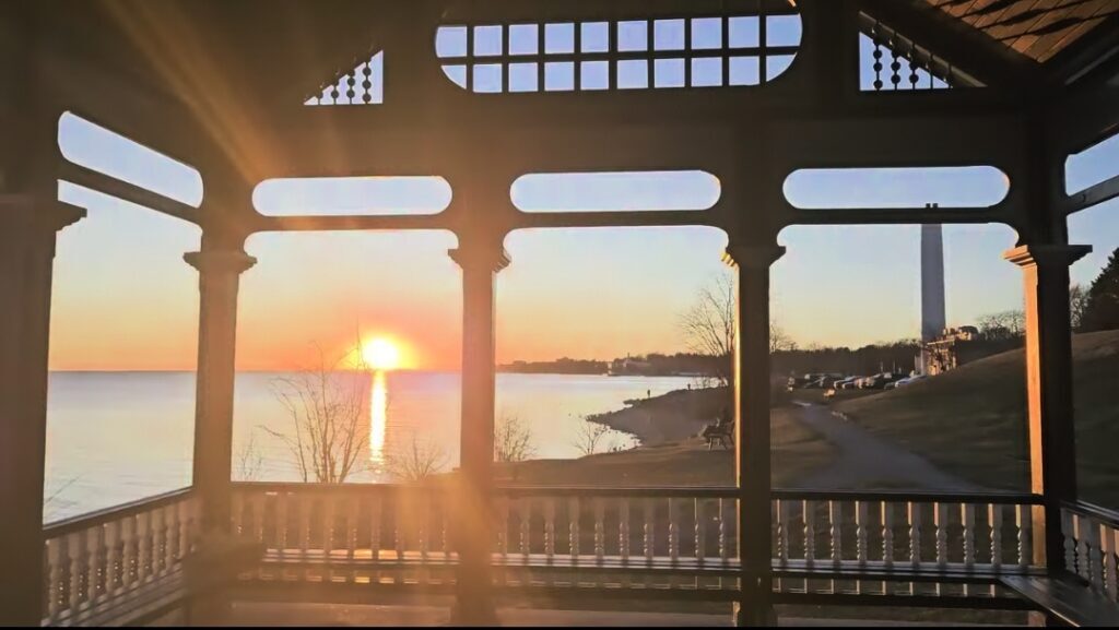 Sunset waterfront view from inside the Newlands Pavilion Bandstand in Kingston 