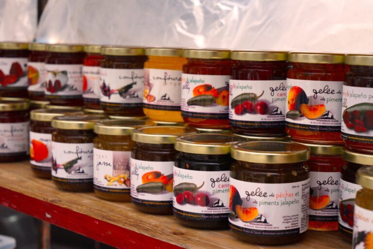 rows of multi-coloured jams line the Henderson Farm booth's shelves