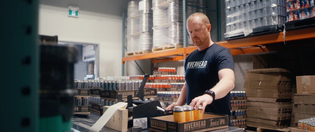 Riverhead beers being placed on a pallet 